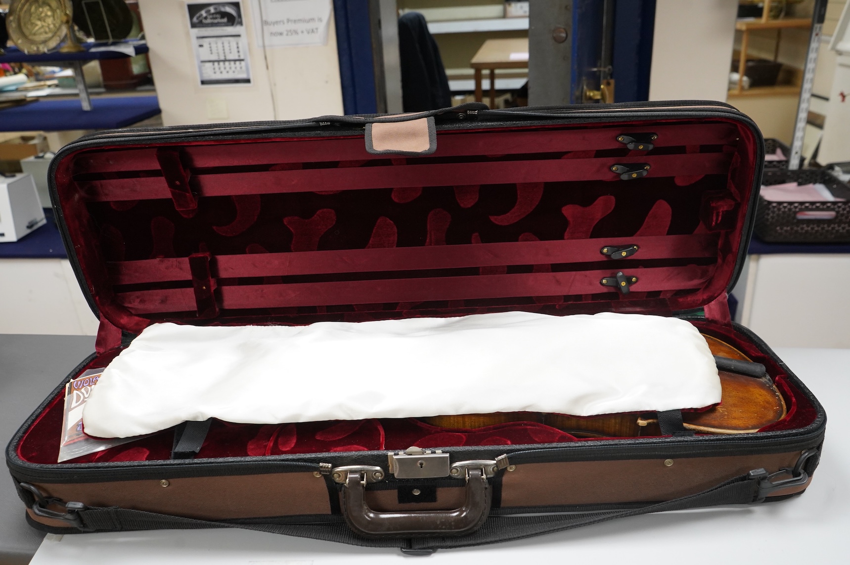 A cased late 19th century German viola, the body 15 3/4”, bearing a label reading Max Lutz 1939